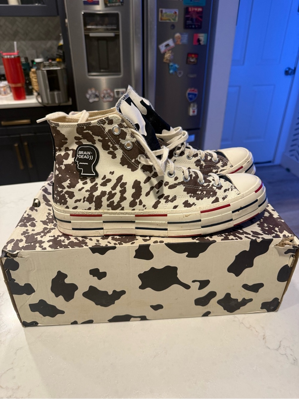 Brain Dead Kids High-Top Sneakers in Cream & Brown Cow Pattern